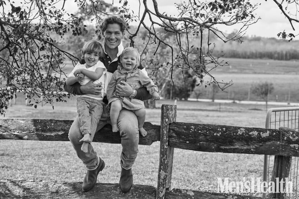Michael Hooper with kids in black and white